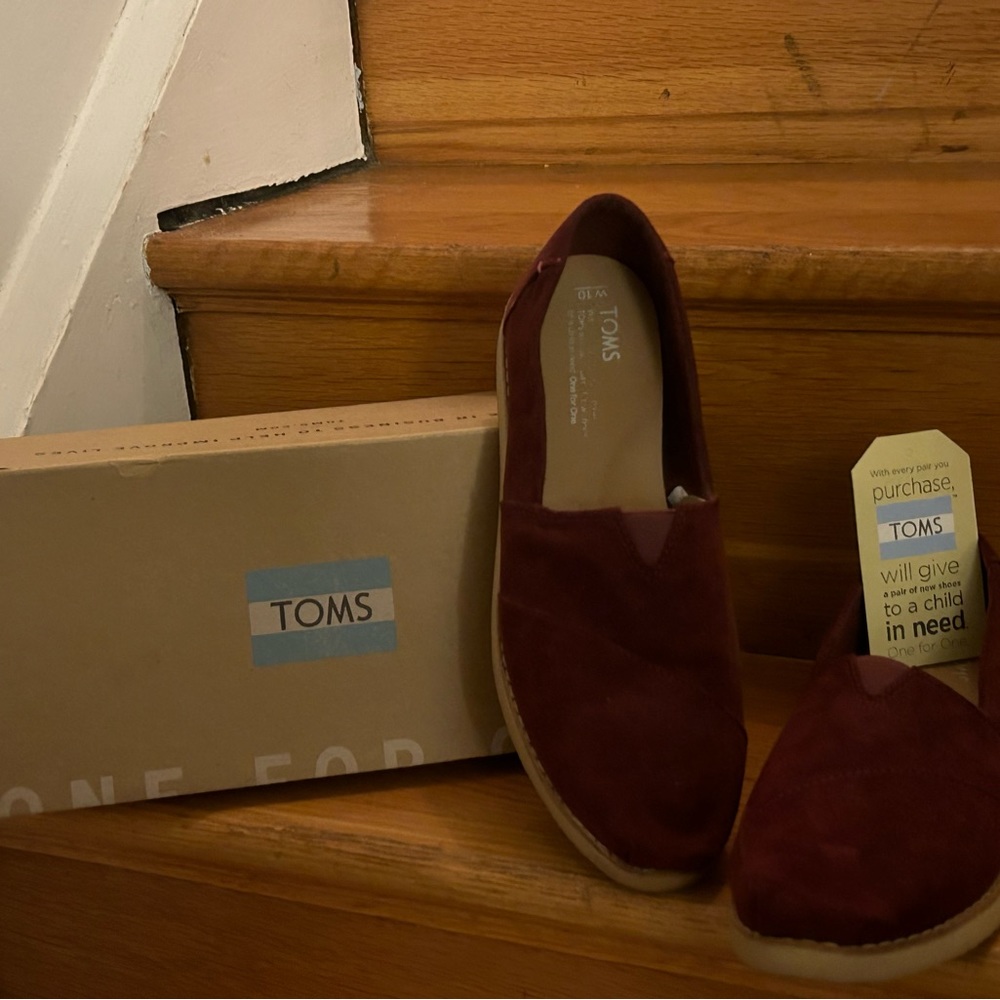 Burgundy Suede Loafers by Toms - Size 10. Like new. No wear.